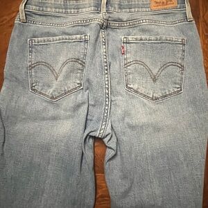 Levi's Blue Denim Jeans with Patterned Waistband, fits like 8
